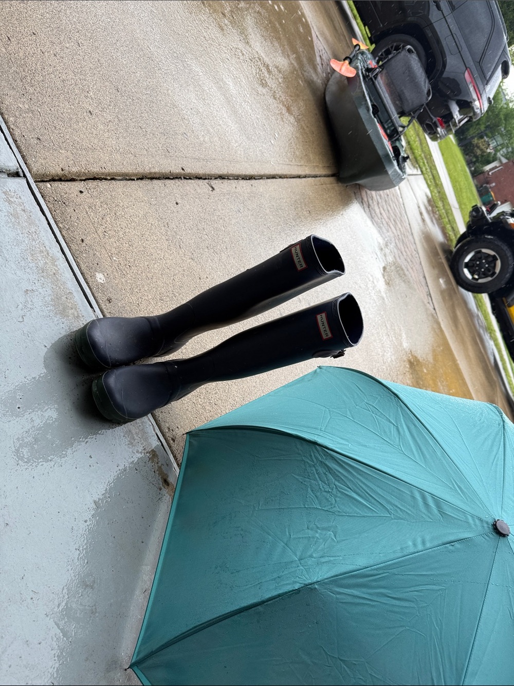 Hunter Tall Black Rain Boots with Dark Green Soles